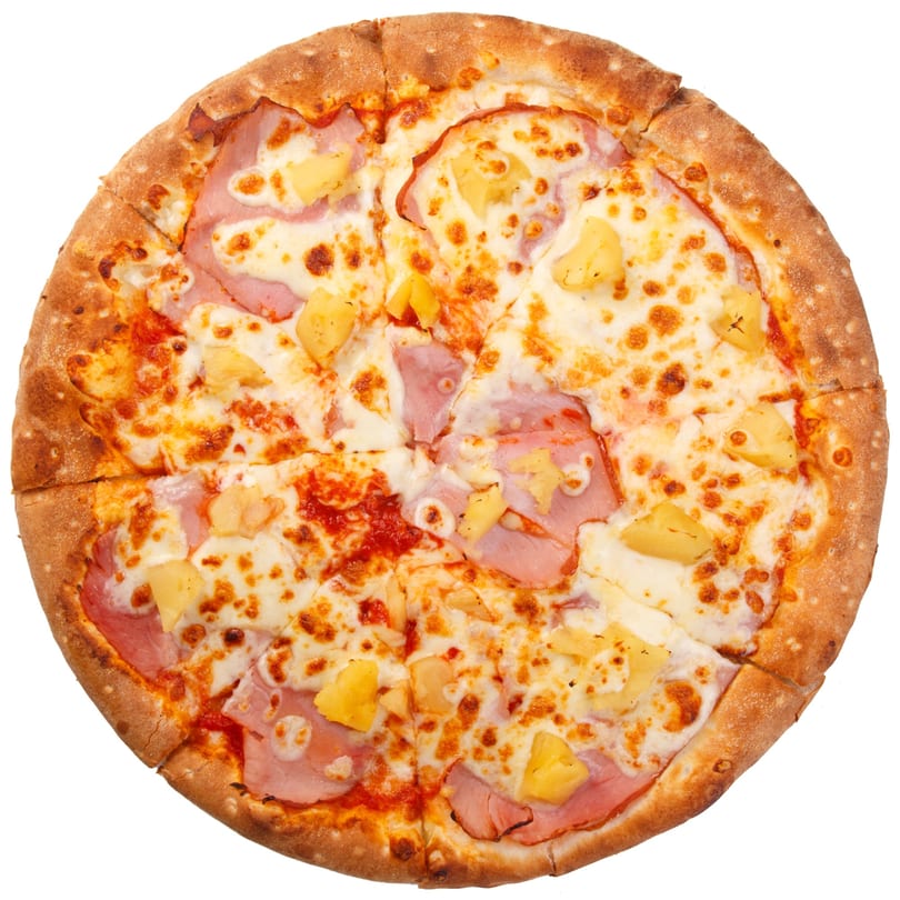 Wicked Pizza Company's Hawaiian pizza, topped with ham, pineapple, and melted cheese, sliced and ready to eat.